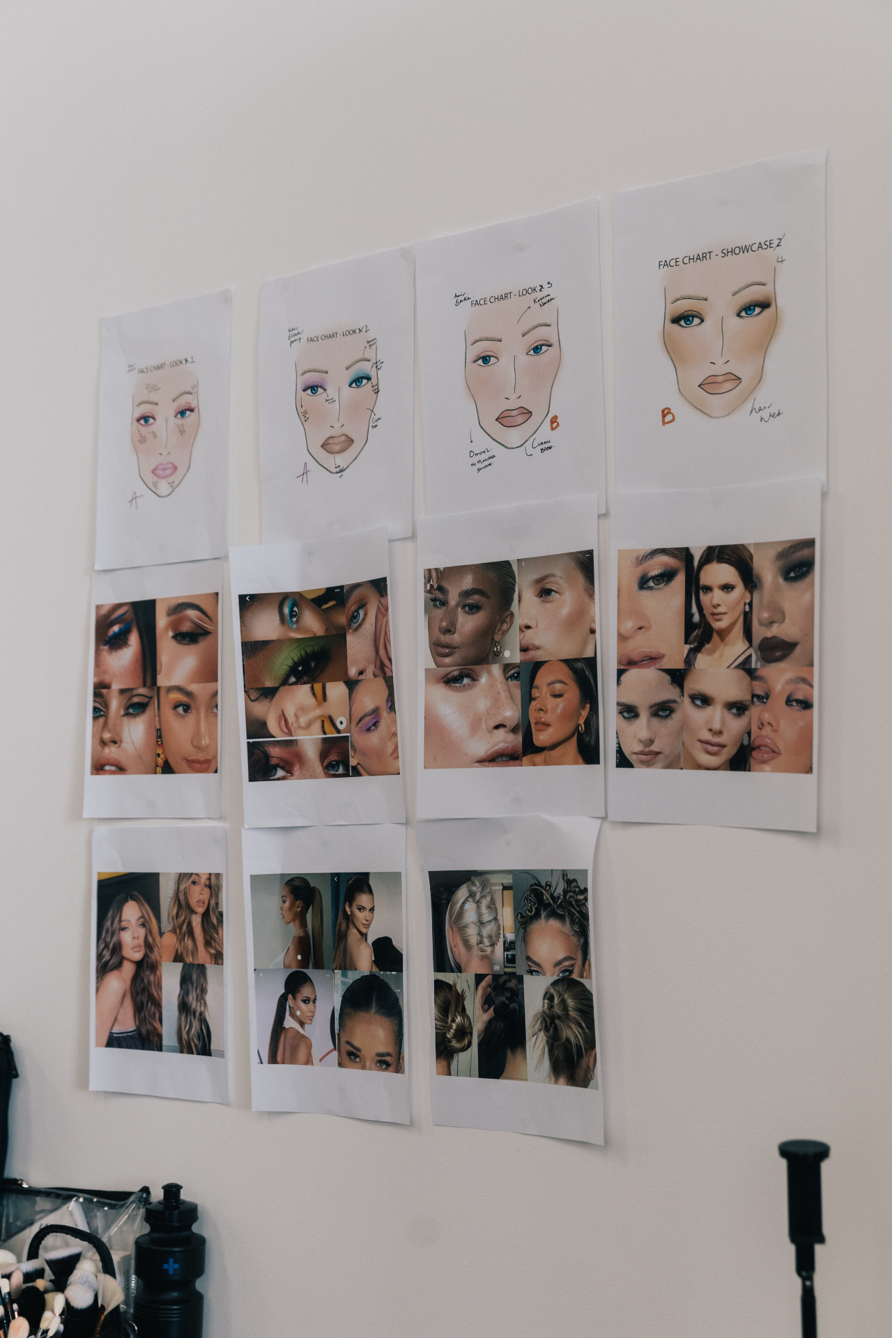 Creative references pinned on the studio wall