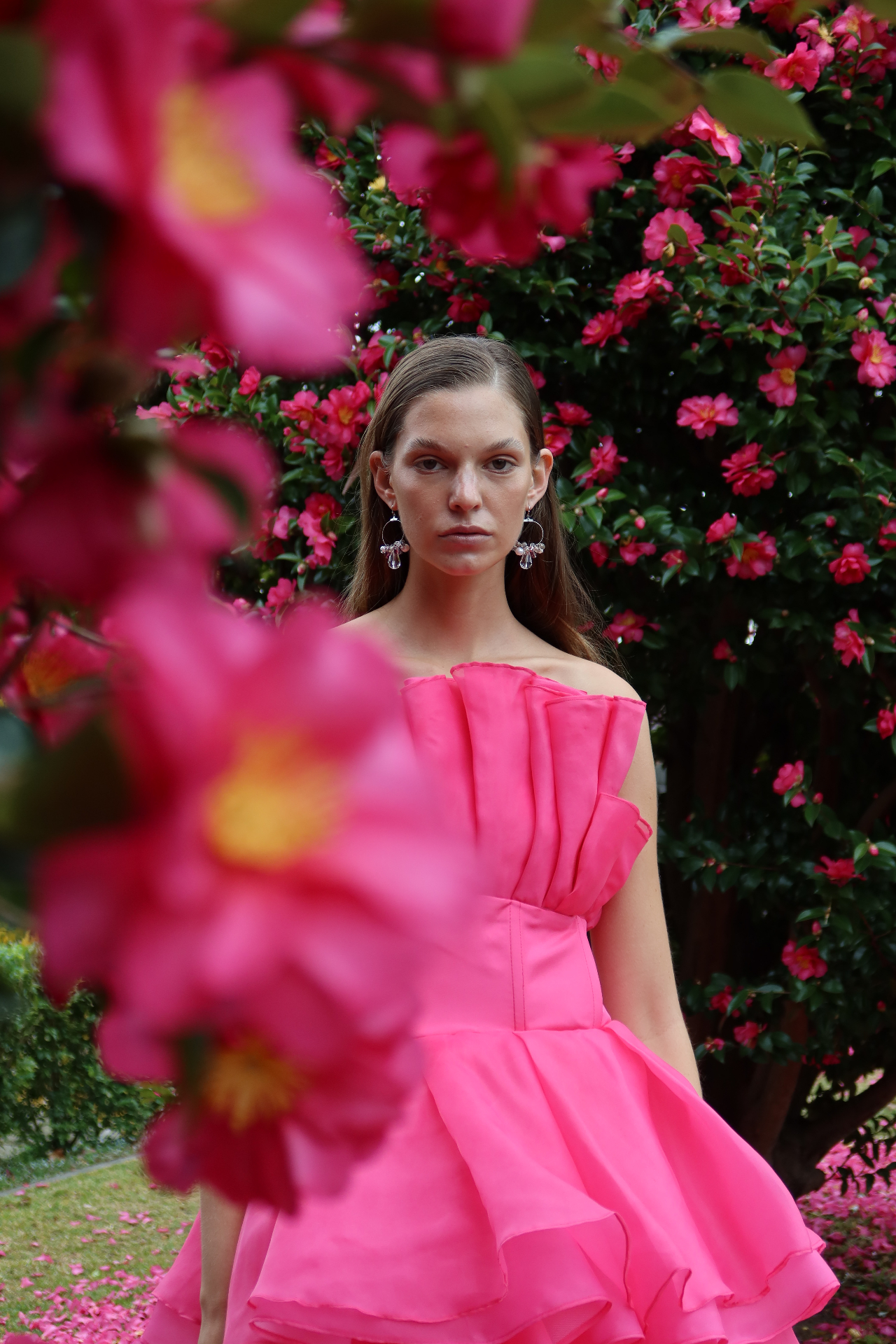 Pink dress portrait framed by flowers