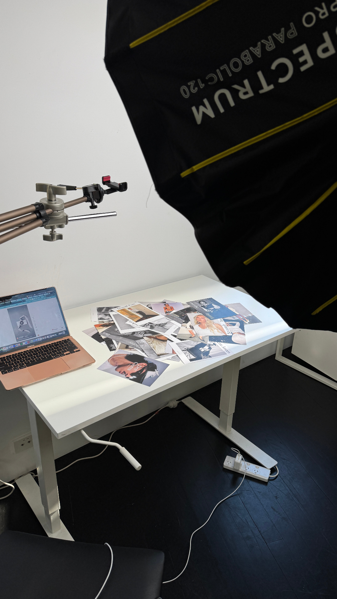 Overhead poster shoot setup with parabolic softbox