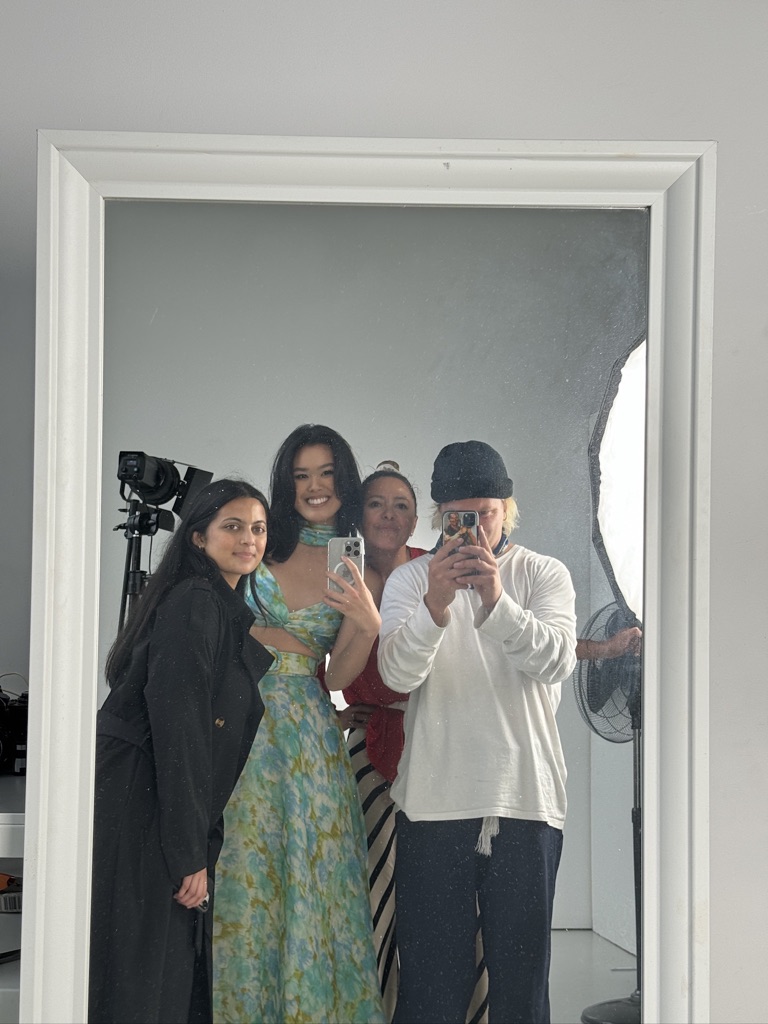 Mirror selfie with the team in a floral gown