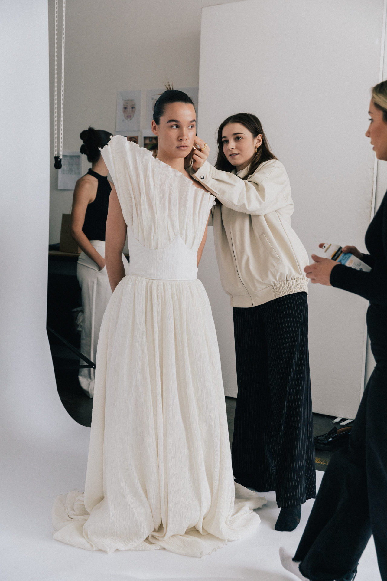 Styling adjustments during studio shoot